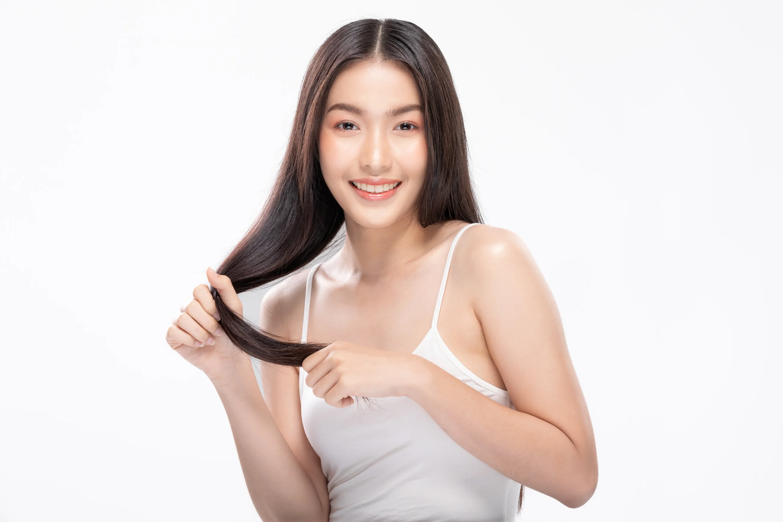 radiant-asian-woman-with-captivating-smile-healthy-lustrous-hair-exuding-confidence-natural-beauty-perfect-beauty-campaigns-lifestyle-self-care-conceptisolated-white